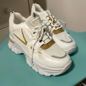 Brand new size 8 1/2 to 9 platform sneakers